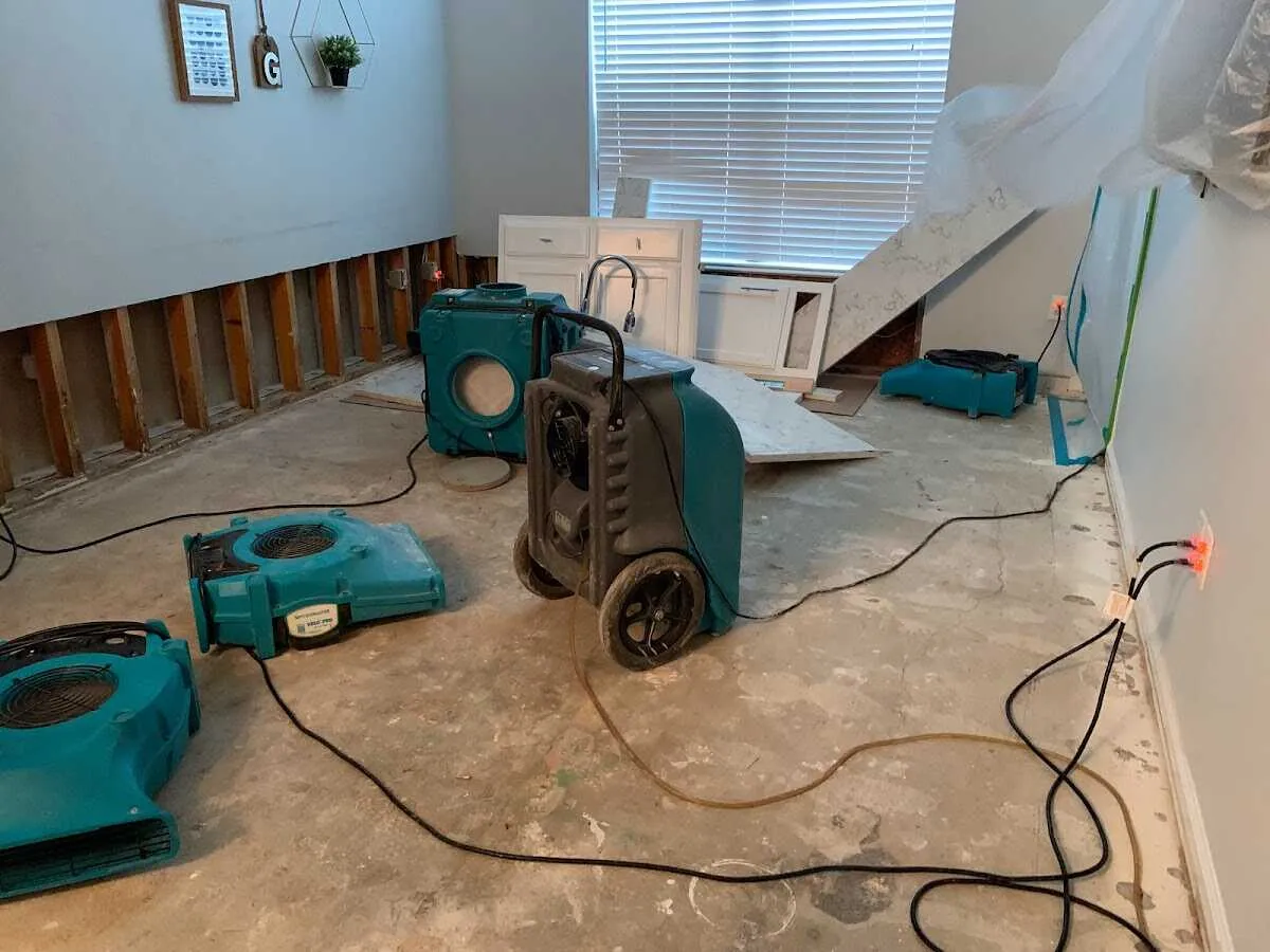 Dehumidifier in flood-cut room for Water Damage Restoration in Russellville